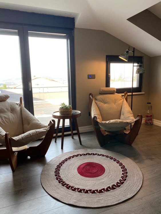 Experience the luxurious feel of a handmade natural jute rug with its high-quality fibers and unique designs.