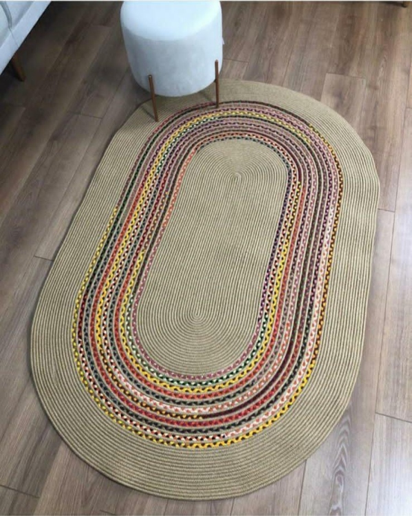 Experience the luxurious feel of a handmade natural jute rug with its high-quality fibers and unique designs.