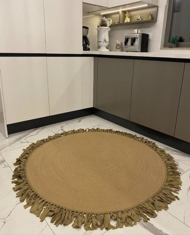 Experience the luxurious feel of a handmade natural jute rug with its high-quality fibers and unique designs.