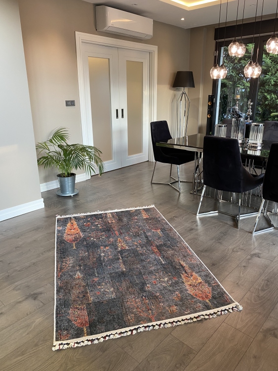 This vibrant digital printed rug features a bold pattern with pops of color, finished off with colorful fringes or braided fringes