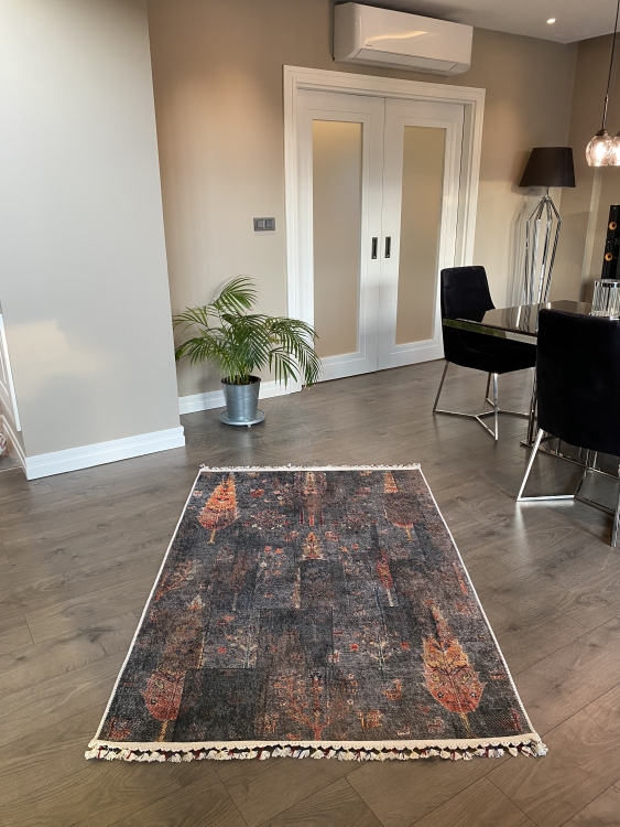 This vibrant digital printed rug features a bold pattern with pops of color, finished off with colorful fringes or braided fringes