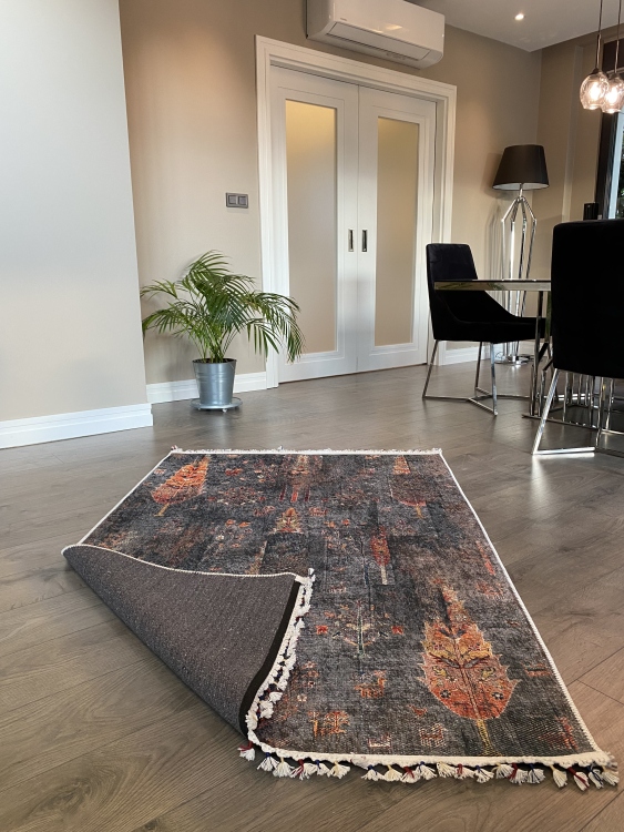 This vibrant digital printed rug features a bold pattern with pops of color, finished off with colorful fringes or braided fringes