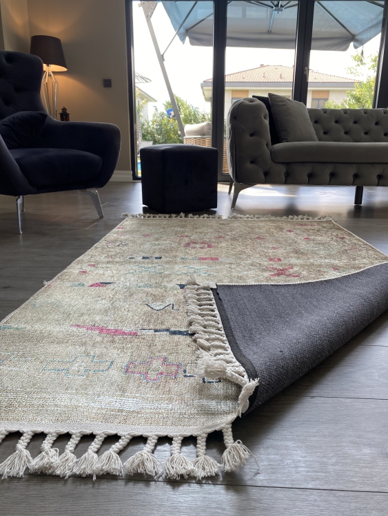 This vibrant digital printed rug features a bold pattern with pops of color, finished off with colorful fringes or braided fringes