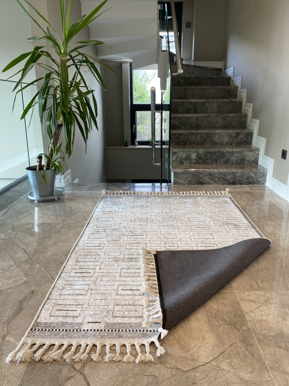 This vibrant digital printed rug features a bold pattern with pops of color, finished off with colorful fringes or braided fringes