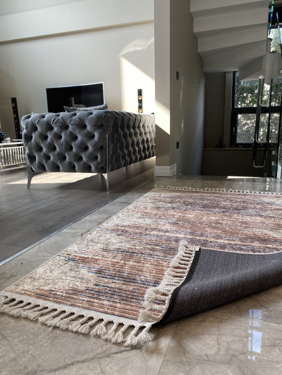 This vibrant digital printed rug features a bold pattern with pops of color, finished off with colorful fringes or braided fringes