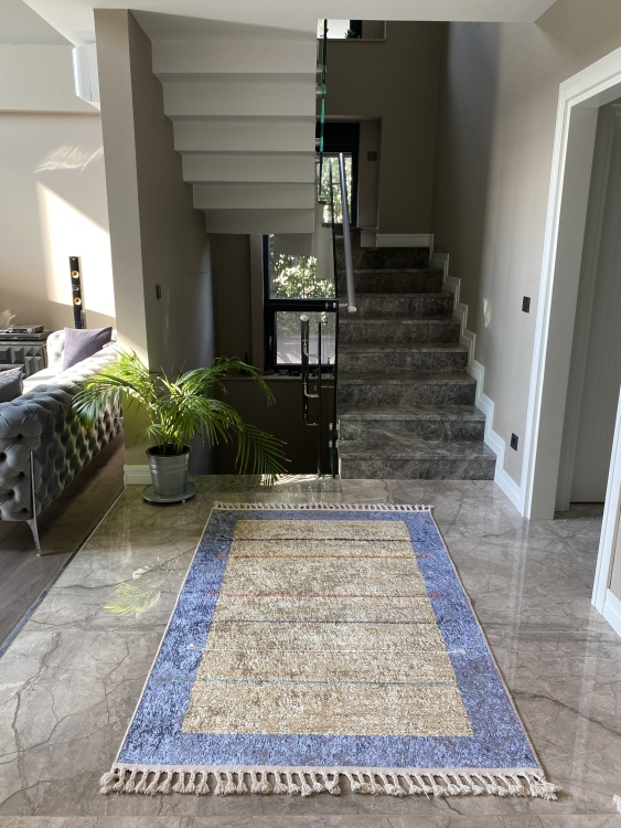 This vibrant digital printed rug features a bold pattern with pops of color, finished off with colorful fringes or braided fringes