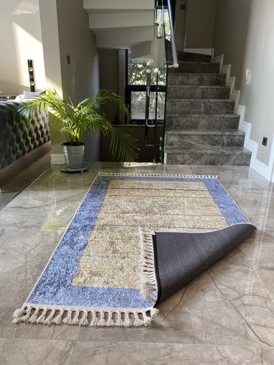 This vibrant digital printed rug features a bold pattern with pops of color, finished off with colorful fringes or braided fringes