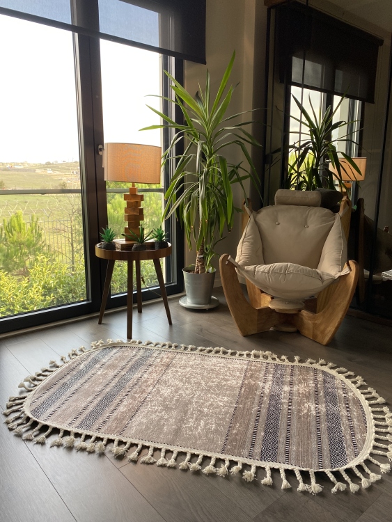 This vibrant digital printed rug features a bold pattern with pops of color, finished off with colorful fringes or braided fringes