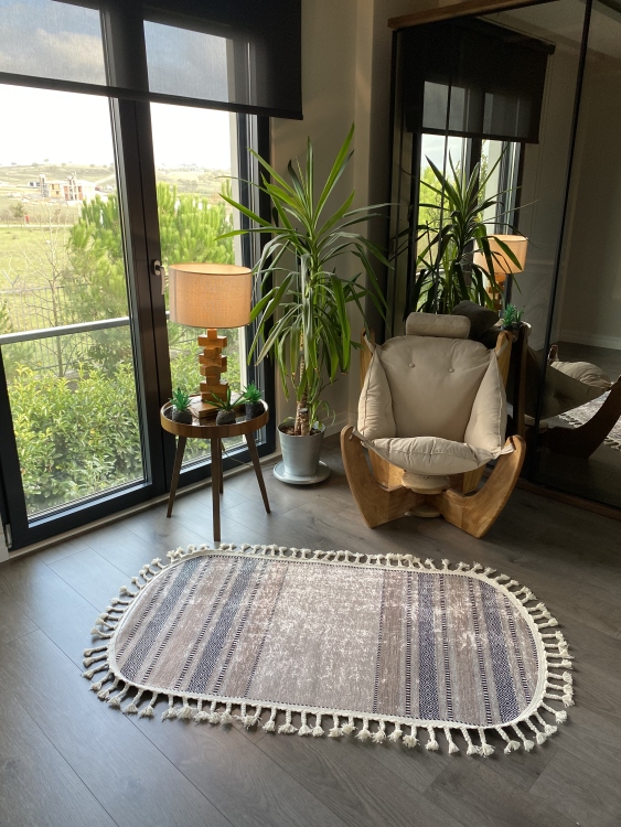 This vibrant digital printed rug features a bold pattern with pops of color, finished off with colorful fringes or braided fringes