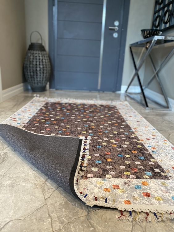 This vibrant digital printed rug features a bold pattern with pops of color, finished off with colorful fringes or braided fringes