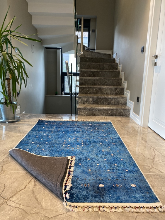 This vibrant digital printed rug features a bold pattern with pops of color, finished off with colorful fringes or braided fringes