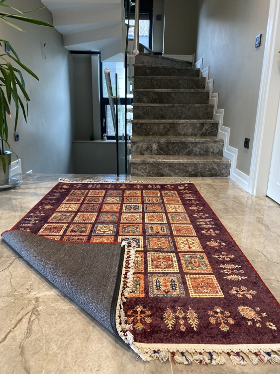 This vibrant digital printed rug features a bold pattern with pops of color, finished off with colorful fringes or braided fringes