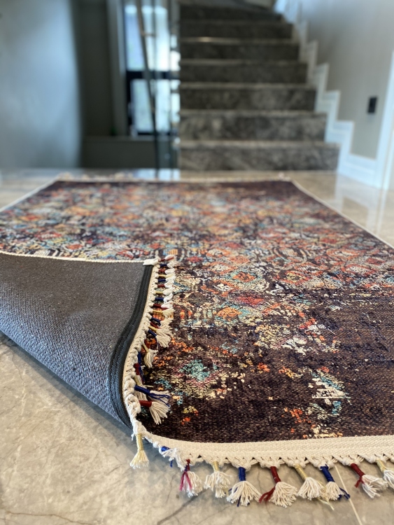 This vibrant digital printed rug features a bold pattern with pops of color, finished off with colorful fringes or braided fringes
