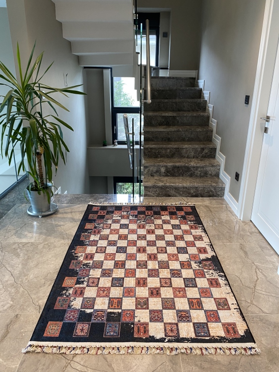 This vibrant digital printed rug features a bold pattern with pops of color, finished off with colorful fringes or braided fringes