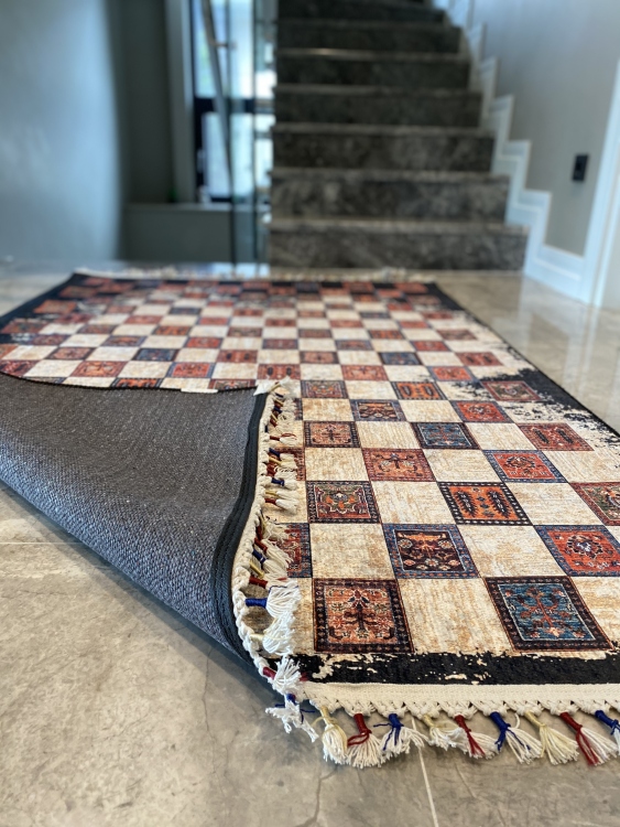 This vibrant digital printed rug features a bold pattern with pops of color, finished off with colorful fringes or braided fringes