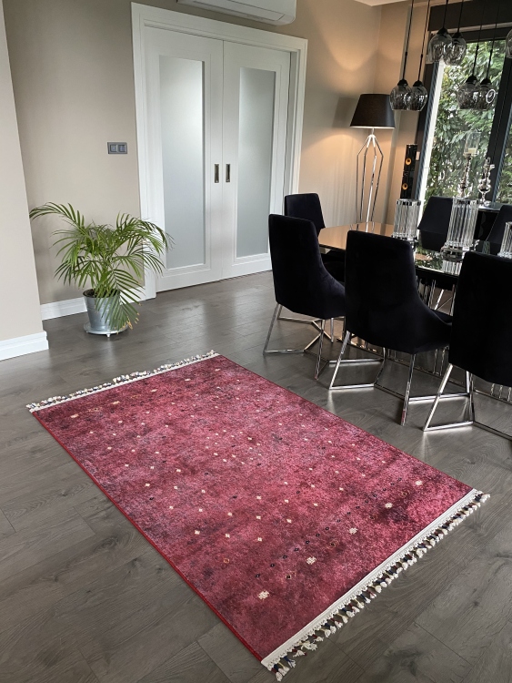 This vibrant digital printed rug features a bold pattern with pops of color, finished off with colorful fringes or braided fringes