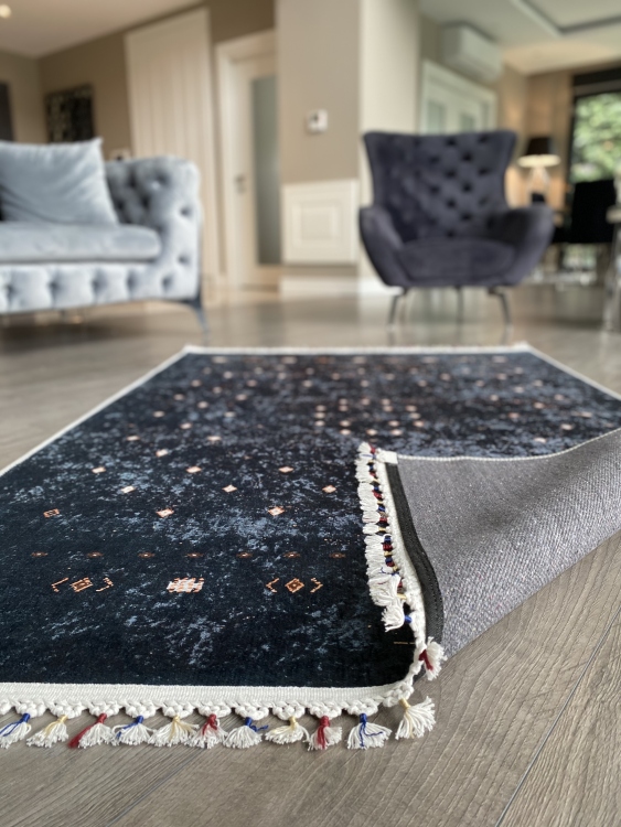 This vibrant digital printed rug features a bold pattern with pops of color, finished off with colorful fringes or braided fringes