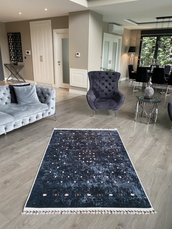 This vibrant digital printed rug features a bold pattern with pops of color, finished off with colorful fringes or braided fringes