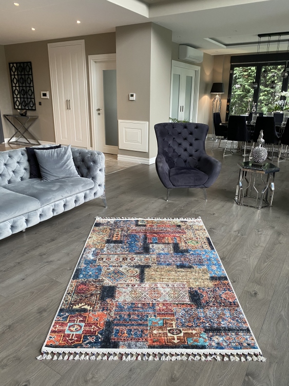 This vibrant digital printed rug features a bold pattern with pops of color, finished off with colorful fringes or braided fringes