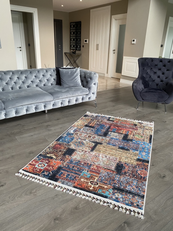 This vibrant digital printed rug features a bold pattern with pops of color, finished off with colorful fringes or braided fringes