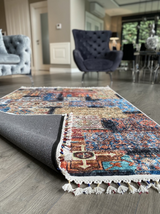 This vibrant digital printed rug features a bold pattern with pops of color, finished off with colorful fringes or braided fringes