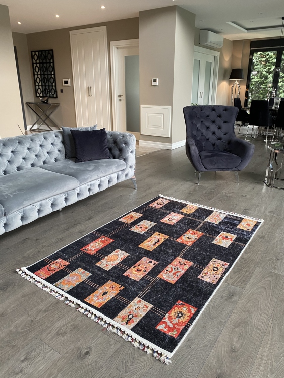 This vibrant digital printed rug features a bold pattern with pops of color, finished off with colorful fringes or braided fringes