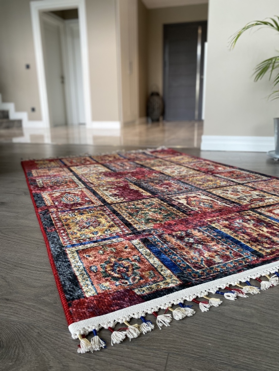 This vibrant digital printed rug features a bold pattern with pops of color, finished off with colorful fringes or braided fringes