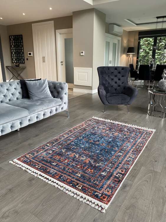 This vibrant digital printed rug features a bold pattern with pops of color, finished off with colorful fringes or braided fringes