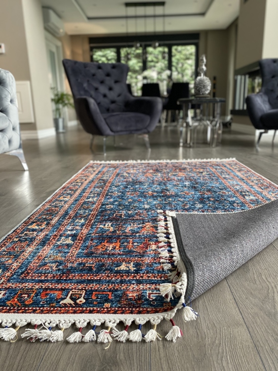 This vibrant digital printed rug features a bold pattern with pops of color, finished off with colorful fringes or braided fringes