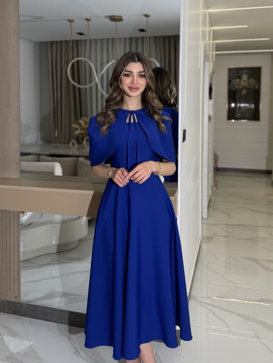 نيلي      Elegant Midi Dress with Shoulder Cape
