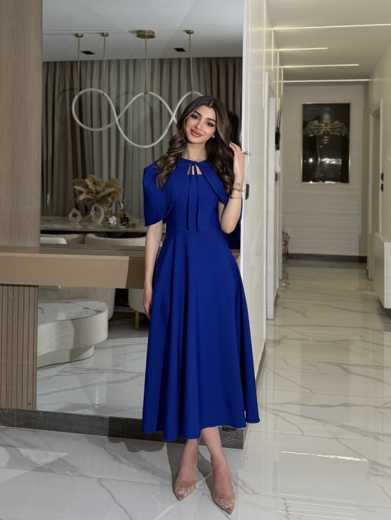 نيلي      Elegant Midi Dress with Shoulder Cape