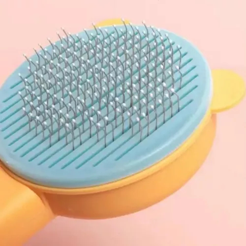 فرشاة الحيوانات الأليفة ذاتية التنظيف لإزالة شعر القطط