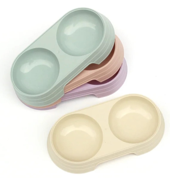 وعاء طعام مزدوج للحيوانات الأليفة، أو صحن طعام وماء للقطط والكلاب. 