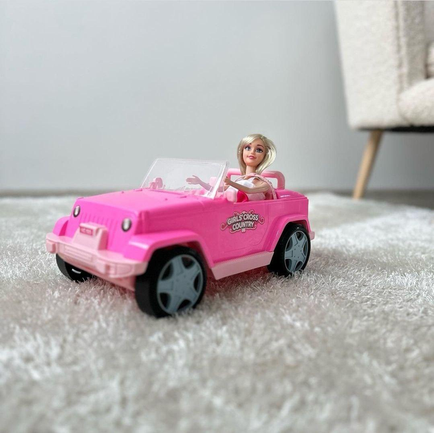 لعبه دمية مع سيارة رياضية رودستر