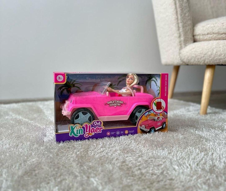 لعبه دمية مع سيارة رياضية رودستر